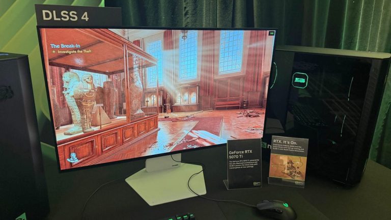 A computer on a table showing a game, Indiana Jones and the Great Circle, played on a PC.